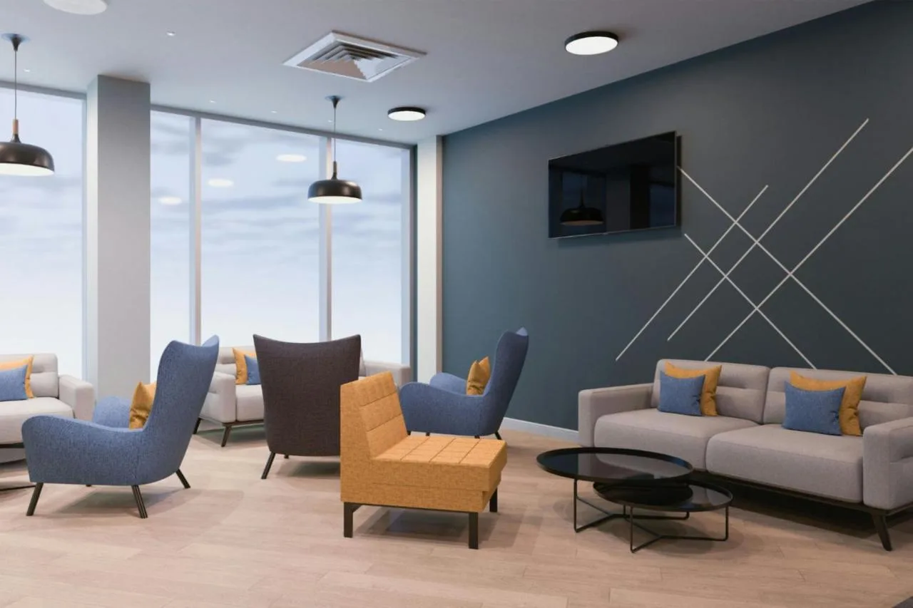 Shared lounge with sofas and a television